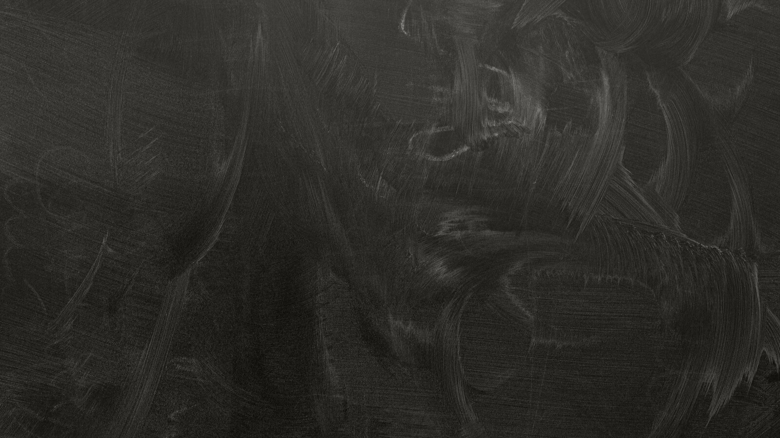 Dark chalkboard, faint chalk marks
